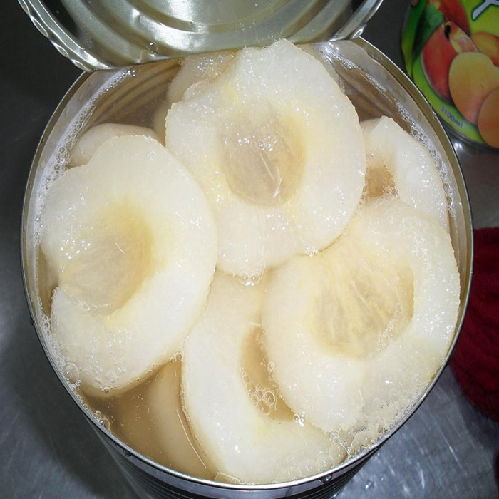 canned pear half in light syrup