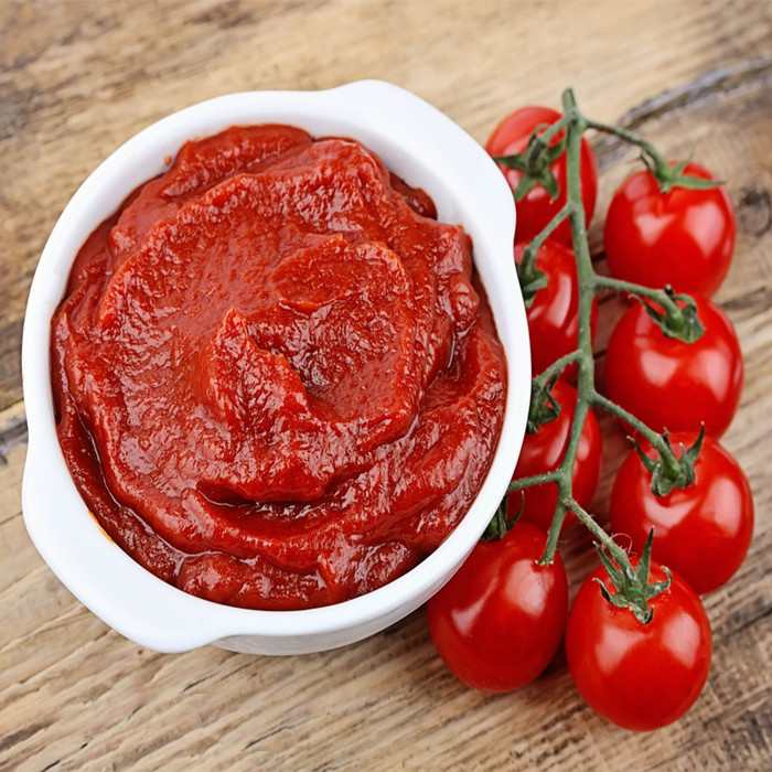 canned tomato paste manufacturer